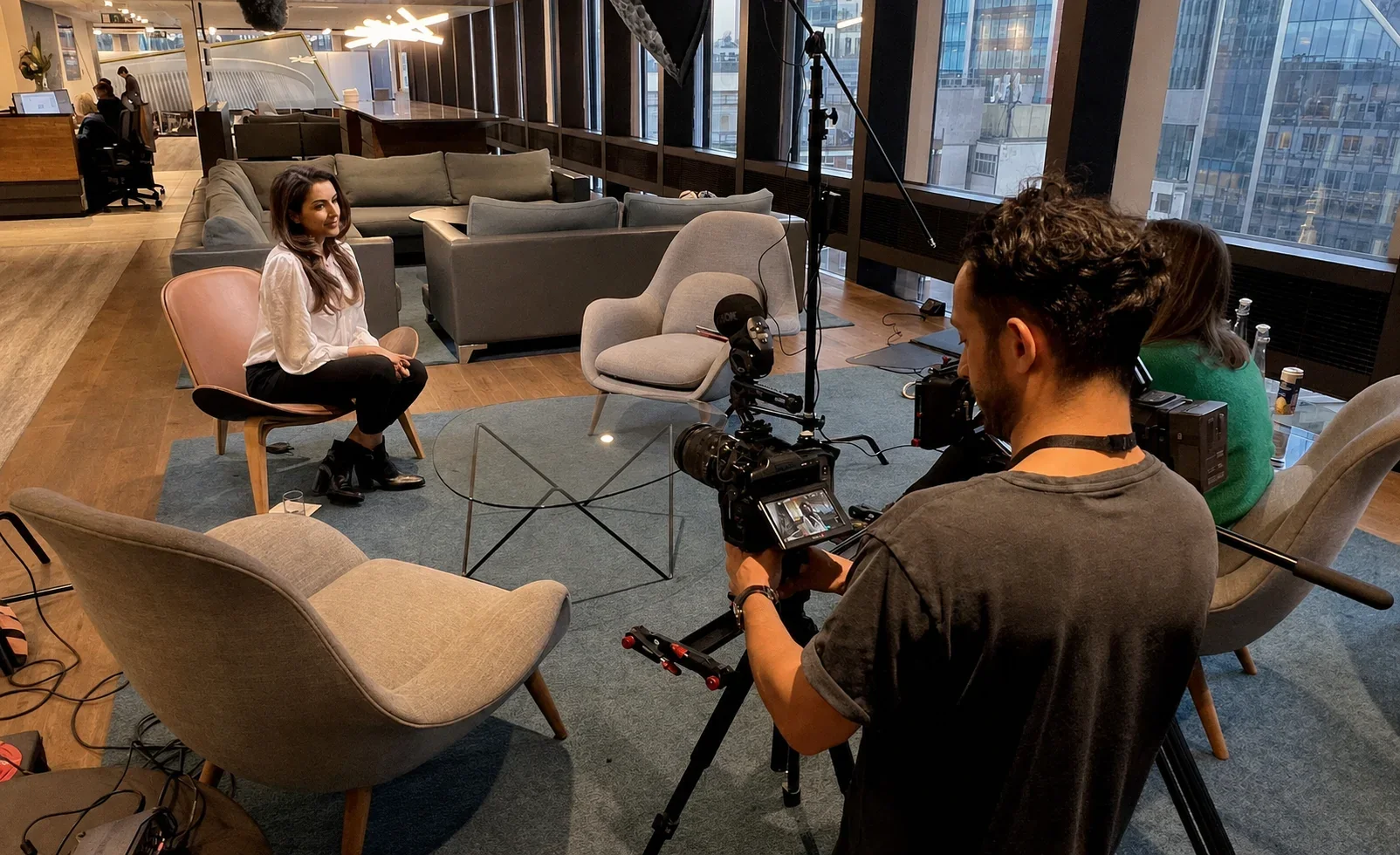 Camera crew filming a live interview production